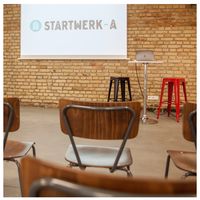 Präsentation mit Kinobestuhlung im StartWerk-A Eventspace